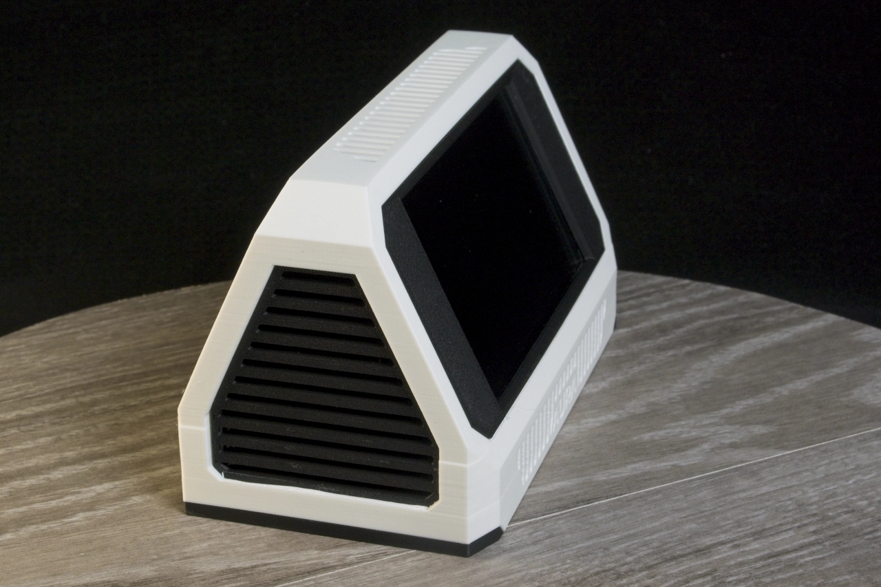 Aura original case (white) — side view showing the angled stand and ventilation grille
